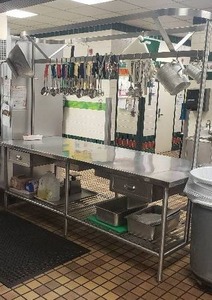 lot 57 image: Stainless Double-Sided Prep Table w 4-Drawers & Top Rack 94 Long  CONTENTS NOT INCLUDED