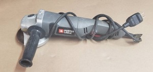 lot 15 image: Porter Cable 7.5 Amp 4.5 Angle Grinder - Model PC750AG