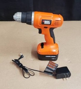 lot 25 image: Black & Decker 12v Cordless Drill w Battery & Charger - Model GC01200