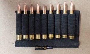 lot 10 image: 9 Rounds of 7MM Remington Magnum Ammo with Allen Rifle Buttstock Cartridge Holder