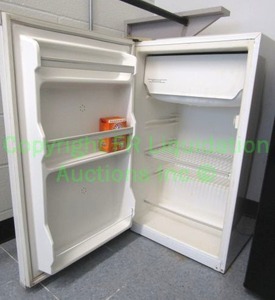 lot 10 image: Haier Welbilt under counter 4.0 cu. ft. refrigerator w freezer section Model BC-111, white