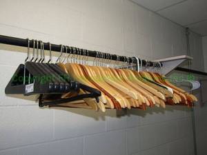 lot 11 image: 7 Vogel Peterson molded designer Mad Men style hangers and approximately 35 wooden hangers
