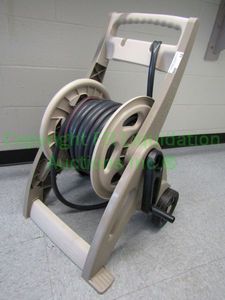 lot 12 image: Hose Mobile portable garden hose storage caddy with hose