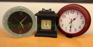 lot 15 image: Quartz clock trio. Includes Victory, TimeKeeper and mantle clock w handle