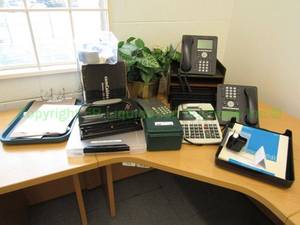 lot 16 image: Office electronics and supplies. Includes Avaya desk phones, Canon electric calculator and Sentry CA 279 portable calculators Plus