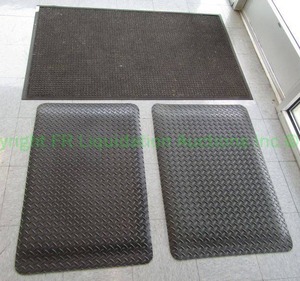 lot 19 image: Anti Fatigue mats with diamond plate pattern (2) and commercial entry door mat