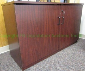 lot 55 image: Laminate mahogany pattern double door locking storage cabinet with keys