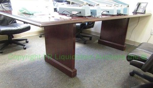 lot 64 image: Laminate top mahogany pattern wood trim conference table (Contents not included), 24x96x36 in