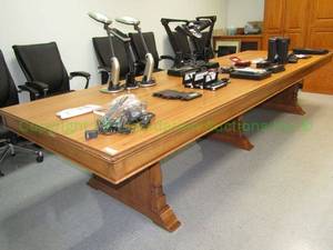 lot 159 image: Red Maple base laminate top conference table with 3 support legs. minor scratches on surface. Legs can be separated from top for moving. 24x144x36 in