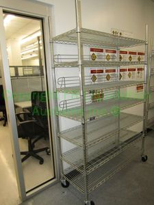 lot 173 image: Heavy duty rolling metal 7-shelf unit