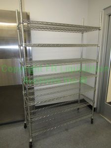 lot 172 image: Heavy duty rolling metal 7-shelf unit