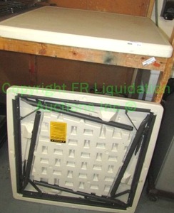 lot 214 image: ICEBERG square folding portable table. Has cut in laminate top (see photos), 36x36x48 in TWO TABLES TOTAL