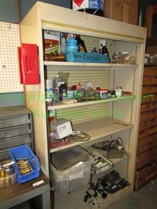 lot 221 image: Vintage metal cabinet with rolling door. Contents not included. 72x36x12 in