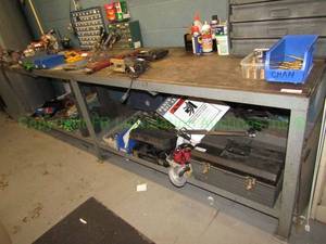 lot 228 image: Metal work bench with under shelf, 24x120x30 in. Contents not included (buyer to remove, please bring help).