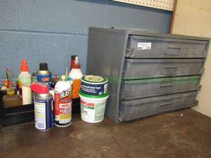 lot 230 image: Portable metal inventory control 4-drawer system w contents (left side bowed) and assorted lubricants