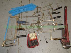 lot 231 image: RIDGID 24 Pipe wrench and assorted hackjig saws