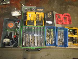 lot 234 image: SpeedOut drill bit kit, assorted drill bits and storage and hole saws