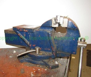 lot 235 image: 4 swivel base Bench Vise. (Mounted to bench Buyer must remove)
