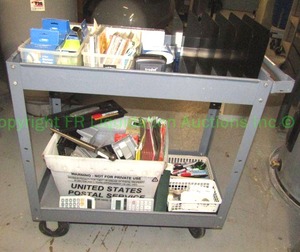 lot 250 image: Rolling metal cart with assorted office supplies and labels
