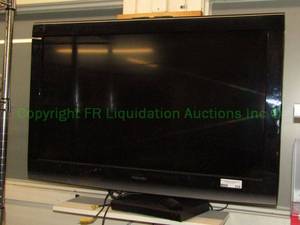 lot 338 image: Toshiba TV 37 and Samsung Receiver w remote (Mounted to wall, buyer must remove)