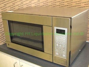 lot 732 image: General Electric stainless steel microwave oven