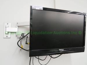 lot 489 image: Viewsonic TV (Model N1930w-2M) on wall mount bracket w Radio AV Receiver antenna, cables (Mounted to wall Buyer to remove)