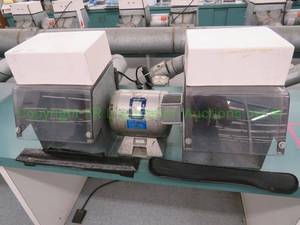 lot 525 image: Baldor 14-hp lighted polishing lathe station (mounted to bench, buyer must remove)