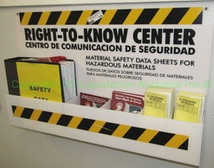 lot 174 image: OSHA Hazard Material Safety Sheet wall mount station (Mounted to wall, buyer must remove), 12X24 in