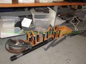 lot 264 image: Contents under table Includes bins, organizers, wood & metal stands plus