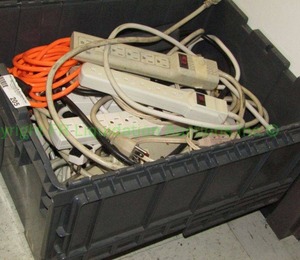 lot 205 image: Assorted surge protectors, power strips and cords. Bin included