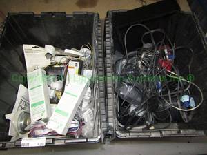 lot 420 image: Reel of wire, electrical components, Advance light ballasts and cords Bins included