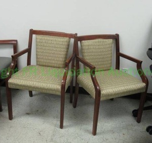 lot 447 image: Taylor Chair upholstered reception arm chairs (fabric needs tucked back in on one - see photos) (Bid is times the quantity)