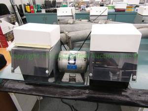 lot 587 image: Baldor 14-hp lighted polishing lathe station (mounted to bench, buyer must remove)