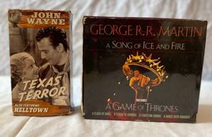 lot 66 image: John Wayne VHS Texas Terror & George Martin A song of Ice & Fire