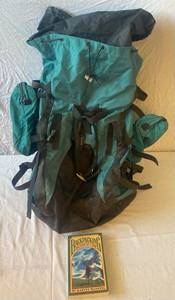 lot 80 image: large backpack by Lowe backpack systems & book