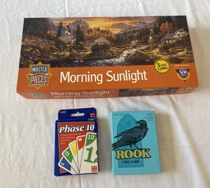 lot 87 image: Morning Sunlight Puzzel & Phase 10 rook card game