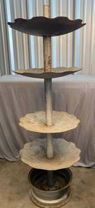 lot 104 image: yard art - 4 teir