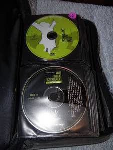 lot 12 image: THE BIBLE EXPERIENCE - 80 CDS IN ALL IN PORTABLE STORAGE BINDER