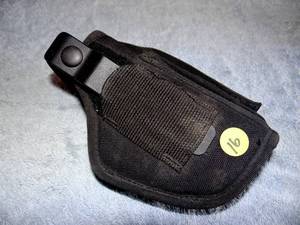 lot 16 image: UNCLE MIKES GUN HOLSTER