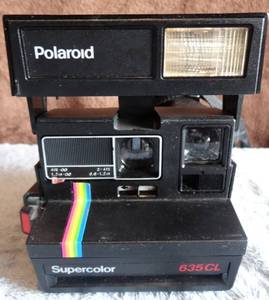 lot 23 image: VINTAGE Polaroid Supercolor 635 CL Instant Film Camera - $$$