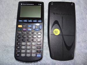 lot 32 image: Texas Instruments TI-89 Graphing Calculator w Cover