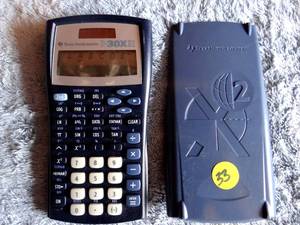 lot 33 image: Texas Instrument TI 30x IIS Scientific Calculator w Cover