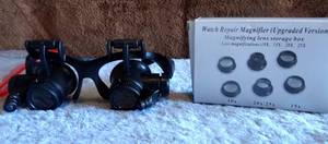 lot 79 image: WATCH REPAIR OPTICALLIGHTED GOGGLES WITH ASSORTED MAGNIFICATION LENSES