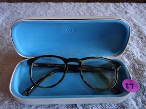 lot 87 image: WARBY PARKER DESIGNER FRAMES IN HARD CASE