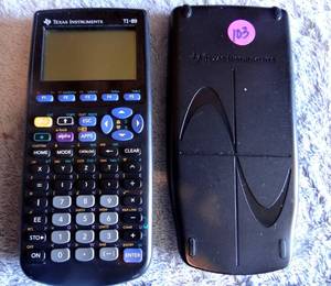lot 103 image: Texas Instruments TI-89 Graphing Calculator w Cover