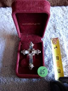 lot 115 image: FAIRCHILD & COMPANY .925 SILVER CROSS PENDANT WITH RUBY COLORED CENTER STONE - BEAUTIFUL