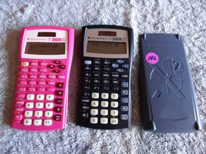 lot 146 image: Texas Instruments TI-30X IIS Pink & Black Scientific Calculators