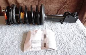 lot 127 image: Leacree 2462125102 Suspension Strut And Coil Spring Assembly