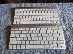 lot 211 image: PAIR OF APPLE PORTABLE KEYBOARDS