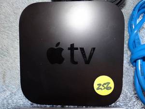 lot 256 image: APPLE TV STREAMING DEVICE WITH REMOTE